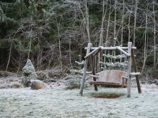 A rocking bench covered with frost, Breitenbush Hot Springs, photo copyright Brent VanFossen.